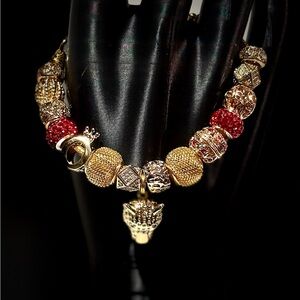 Elegant Gold and Red Beaded Bracelet